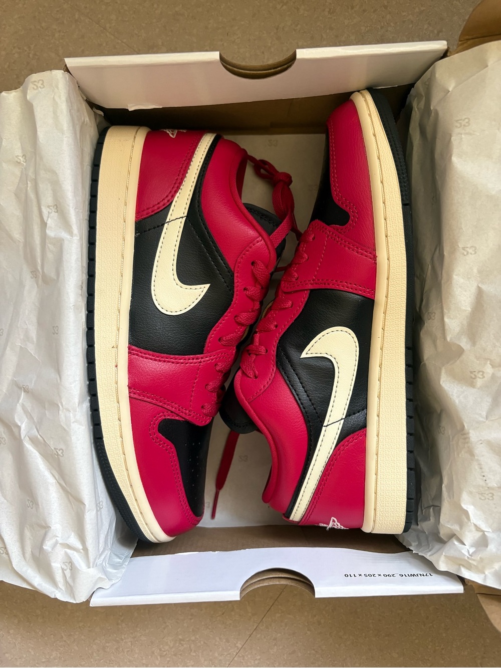 Nike Air Jordan 1 Low — Black, Magenta & Cream Swoosh